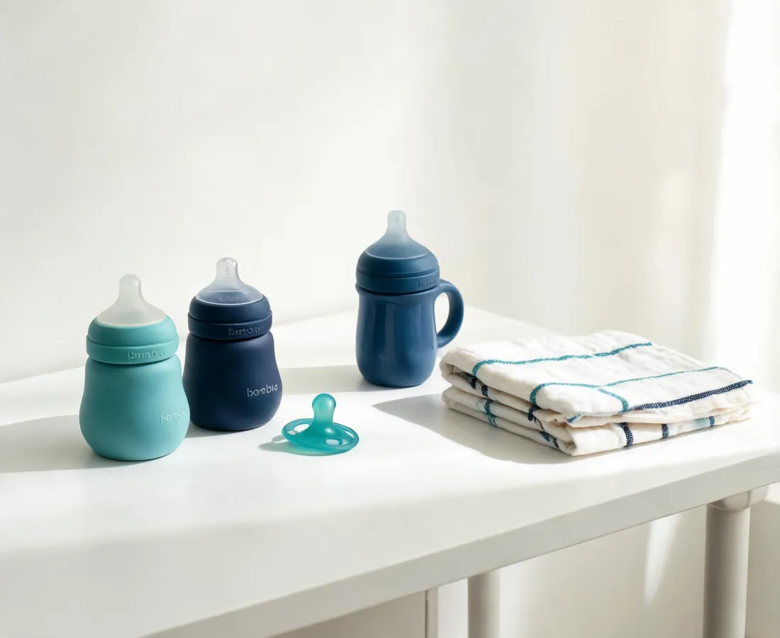 Nanobebe bottles and pacifiers on a clean nursery feeding station